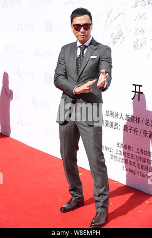 --FILE--Hong Kong star action Donnie Yen pose sur le tapis rouge pour une conférence de presse pour commencer le tournage de son film "Ip Man 3" à Shanghai, Chin Banque D'Images