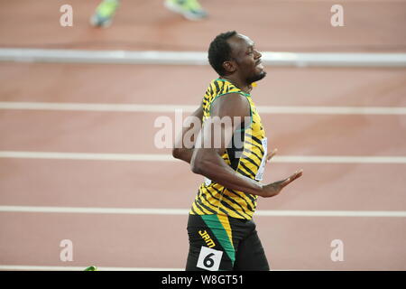 Usain Bolt de la Jamaïque réagit après avoir remporté le 200m masculin au cours de la finale des Championnats du monde IAAF 2015 Beijing au Stade National, également connu sous un Banque D'Images