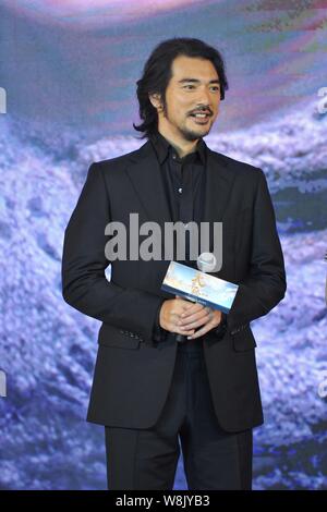 Taiwanese-Japanese l'acteur et chanteur Takeshi Kaneshiro pose lors d'une conférence de presse pour son nouveau film 'La Traversée Part 2" à Beijing, Chine, 22 Juillet 2 Banque D'Images