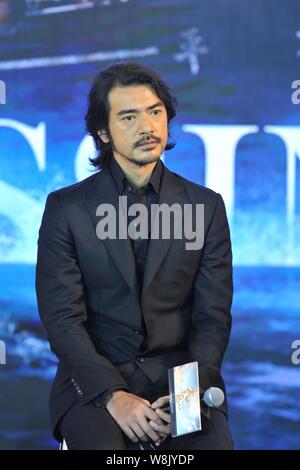 Taiwanese-Japanese l'acteur et chanteur Takeshi Kaneshiro pose lors d'une conférence de presse pour son nouveau film 'La Traversée Part 2" à Beijing, Chine, 22 Juillet 2 Banque D'Images