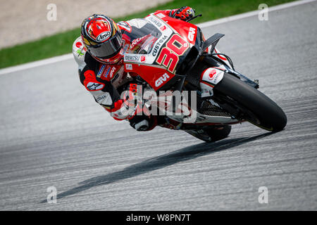 La LCR Honda rider Takaaki Nakagami japonais fait concurrence au cours de la quatrième session de la pratique du Grand Prix MotoGP d'Autriche. Banque D'Images