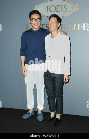 Hong Kong acteur Sean Lau, gauche, et Hong Kong acteur Nick Cheung rire pendant l'ouverture partie pour Tod's 'Dots de vie' exhibition à Hong Kong, Chine Banque D'Images