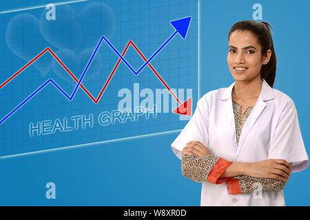 Female doctor smiling with her arms crossed Banque D'Images