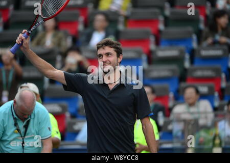 Gilles Simon de France célèbre après avoir battu Tomas Berdych de la République tchèque en quart de la masculin au cours de la 2014 Shangha Banque D'Images