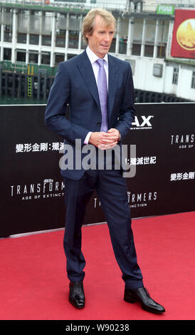 Réalisateur Michael Bay pose sur le tapis rouge pour la première mondiale du film, Transformers : l'âge d'extinction, à Hong Kong, Chine, 19 JU Banque D'Images