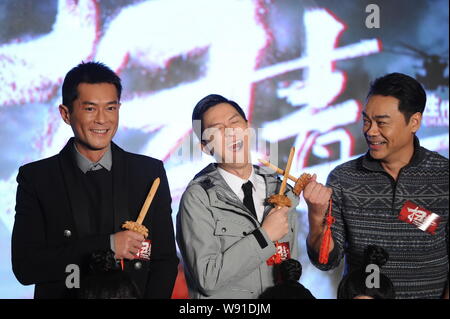 (De gauche) Hong Kong l'acteur Louis Koo, Nick Cheung acteur de Hong Kong, Hong Kong et l'acteur Sean Lau poser lors de la première de leur film, le Livre blanc St Banque D'Images