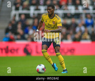 11 août 2019, St James Park, Newcastle upon Tyne, Angleterre ; football Premier League, Newcastle contre Arsenal : Ainsley Maitland-Niles (15) au cours de l'arsenal de crédit : Craig Milner/News Images images Ligue de football anglais sont soumis à licence DataCo Banque D'Images