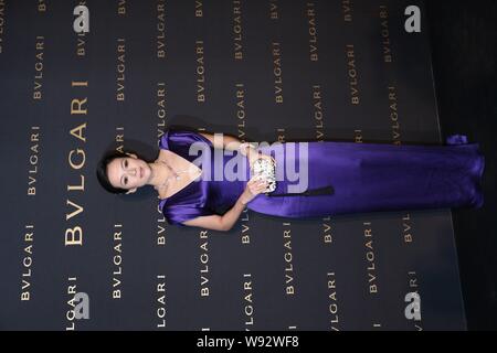 L'actrice chinoise Zhang Ziyi pose à la cérémonie d'ouverture de Bvlgari flagship store à Shanghai, Chine, 15 janvier 2013. Banque D'Images