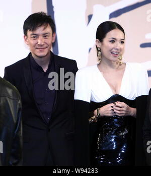Acteur taiwanais Zhang Zhen (à gauche) et l'actrice chinoise Zhang Ziyi poser lors de la première de leur dernier film, Le Grand Maître, à Beijing, Chine, 6 Banque D'Images