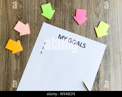 Presse-papiers avec mes objectifs sur bois 24. Banque D'Images