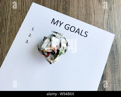 Presse-papiers avec mes objectifs sur bois 24. Banque D'Images