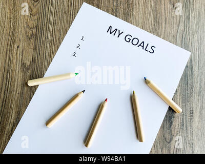 Presse-papiers avec mes objectifs sur bois 24. Banque D'Images