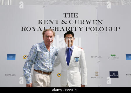 Hong Kong, chanteur et acteur Aaron Kwok (R) et compositeur anglais Andrew Lloyd Webber posent au cours de la Kent & Gurwen charité Royal Polo Cup à Hong Kong, Banque D'Images