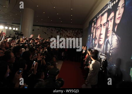 (De gauche) Hong Kong l'acteur Tony Leung Ka Fai, actrice de Hong Kong Hong Kong, Charlie Young, chanteur et acteur Aaron Kwok assister à la première du film Banque D'Images