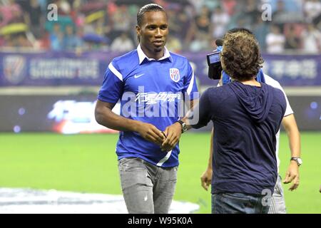 L'ancien attaquant de Chelsea Didier Drogba, le nouveau membre de la Shanghai Shenhua, est photographié pendant le 17ème tour de l'Association de football chinoise 2012 Banque D'Images