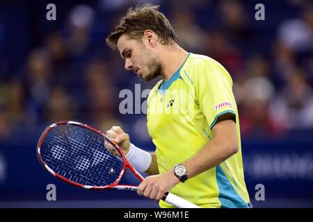Stanislas Wawrinka de Suisse célèbre après avoir marqué contre Roger Federer de la Suisse dans leur troisième match de la mens des célibataires au cours de Banque D'Images
