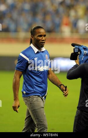 L'ancien attaquant de Chelsea Didier Drogba, le nouveau membre de la Shanghai Shenhua, est photographié pendant le 17ème tour de l'Association de football chinoise 2012 Banque D'Images