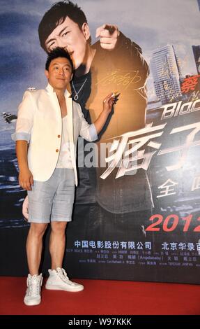 L'acteur chinois Huang Bo pose à la grande première de son nouveau film, noir et blanc, pendant le 15ème Festival International du Film de Shanghai à Shanghai, Banque D'Images