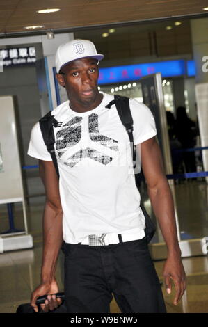 Jamaican mens 100m et 200m record du monde Usain Bolt arrive à l'Aéroport International de Shanghai Pudong à Shanghai, Chine, 20 mai 2010. Usa Banque D'Images