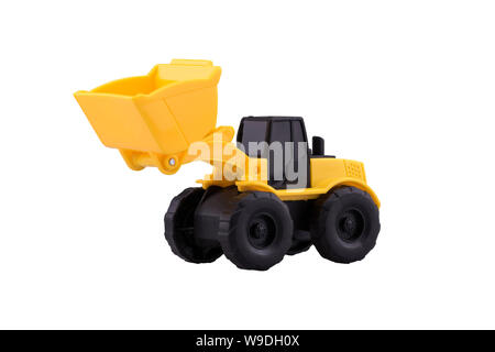 De fabrication robuste, le tracteur toy with clipping path isolé sur fond blanc. Banque D'Images