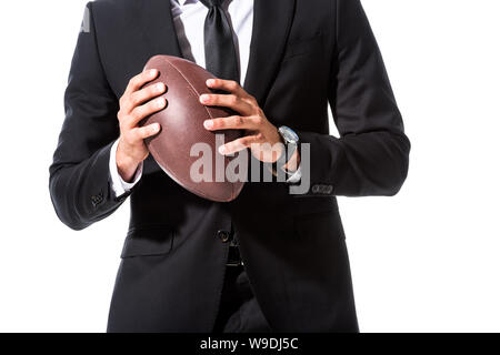 Portrait of businessman en tenue de cérémonie avec ballon de rugby Isolated On White Banque D'Images