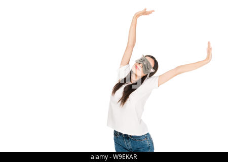 Jeune femme brune dans les yeux de chat de dormir elle-même outstretching isolated on white Banque D'Images