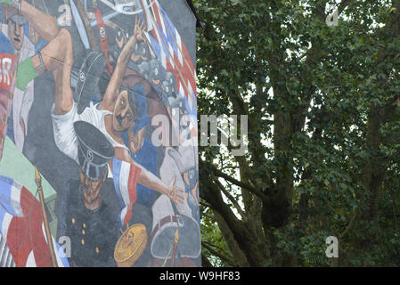 Mur de graffiti et de bois Banque D'Images