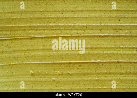 La texture et traits d'un vert clair pour masque bio visage ou corps isolé sur fond blanc Banque D'Images