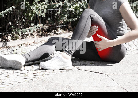 Close-up of a Woman avec entorse de la cuisse Banque D'Images