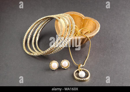 Jewelry with heart shaped oil lamp Stock Photo