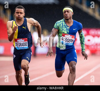 Birmingham, UK. Août 18, 2019. André de Grasse (CAN) et Michael Rodgers (USA) la concurrence sur le 100m lors de la finale du Grand Prix de Birmingham Muller & événement IAAF Diamond League à l'Alexander Stadium. Credit : SOPA/Alamy Images Limited Live News Banque D'Images