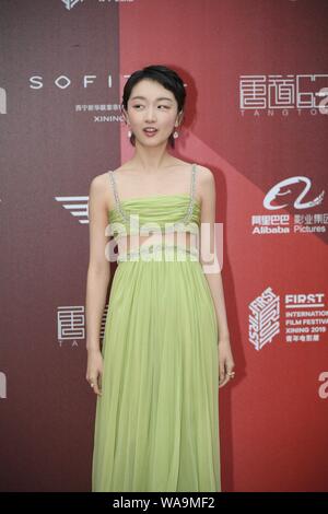 Chinese actress Zhou Dongyu poses at the Stella Mccartney fashion