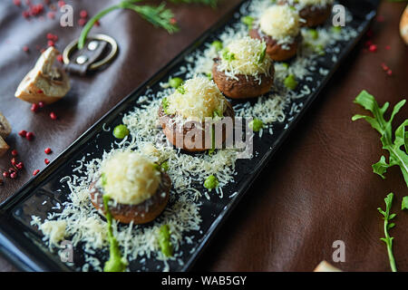 Les champignons avec le fromage Banque D'Images