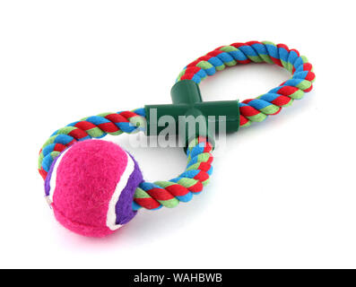 C'est un balle de tennis rose sur une corde. C'est pour jouer avec un chien et en le faisant glisser. Banque D'Images