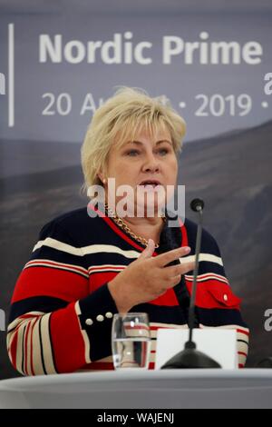 Videy, Islande. 20e Août, 2019. Le Premier Ministre norvégien, Erna Solberg, prendra la parole lors d'une conférence de presse après une rencontre avec la chancelière Merkel et d'autres chefs de gouvernement des pays scandinaves. Credit : Steffen Trumpf/dpa/Alamy Live News Banque D'Images