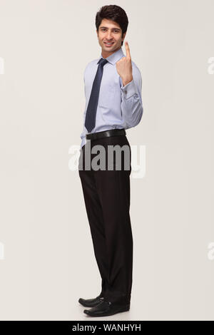 Businessman showing voter sign Banque D'Images