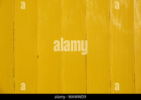 Planches en bois peint jaune vif la texture d'arrière-plan Banque D'Images