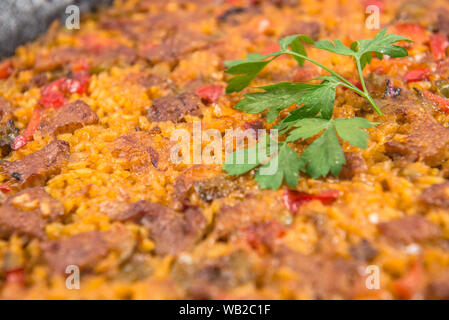 Riz avec des côtes de porc ibérique Banque D'Images