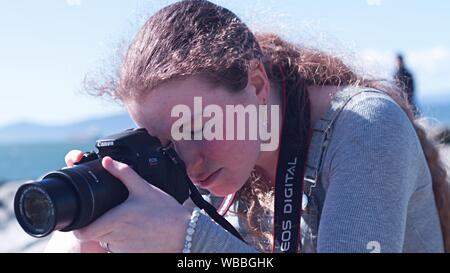 Les jeunes Canon EOS Rebel Banque D'Images