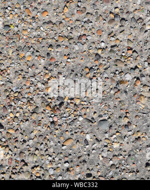 Pastille dans vieille asphalte. La texture de fond de l'ancienne route. Banque D'Images