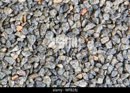 Texture de fond de gravier coloré. Gros plan sur des pierres de quartz macro. Banque D'Images