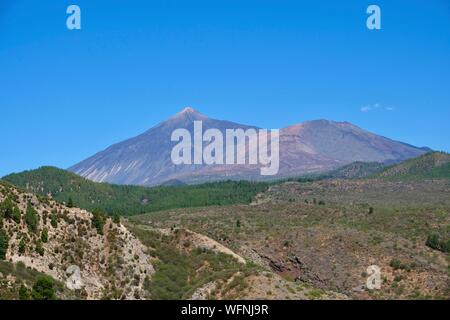 L'Espagne, Iles Canaries, Tenerife Island, le Parc National du Teide, inscrit au Patrimoine Mondial par l'UNESCO, le sommet du Pico de Teide vue de Los Gigantes Banque D'Images