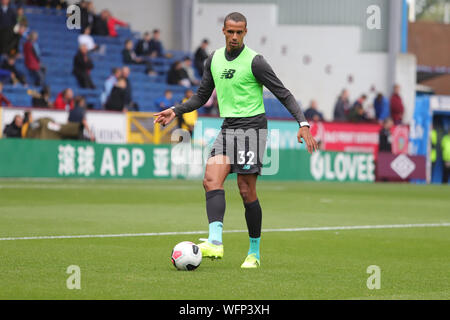 BURNLEY, Angleterre AUG 31ST Joel Matip se réchauffe au cours de la Premier League match entre Burnley et Liverpool à Turf Moor, Burnley le samedi 31 août 2019. (Crédit : Luc Nickerson | MI News) usage éditorial uniquement, licence requise pour un usage commercial. Aucune utilisation de pari, de jeux ou d'un seul club/ligue/dvd publications. Photographie peut uniquement être utilisé pour les journaux et/ou magazines des fins éditoriales Crédit : MI News & Sport /Alamy Live News Crédit : MI News & Sport /Alamy Live News Banque D'Images