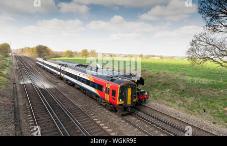The Flying Scotsman est dépassé par le train sud-ouest Banque D'Images