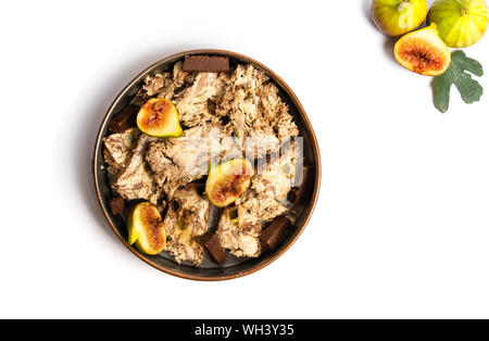 Fig dessert halva tranches de fruits traiter sur une plaque Banque D'Images