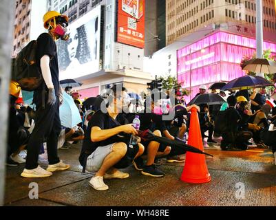 Hong Kong, Chine. Août 31, 2019. Des émeutes s'intensifie dans différents districts après la manifestation pacifique non autorisée. Ici les manifestants sont vus à Causeway. Banque D'Images