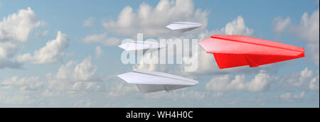 Concept d'entreprise : un groupe d'avions de papier blanc dans un sens entraîner par avion en papier individuelles rouge comme une icône de l'industrie d'affaires à leader Banque D'Images