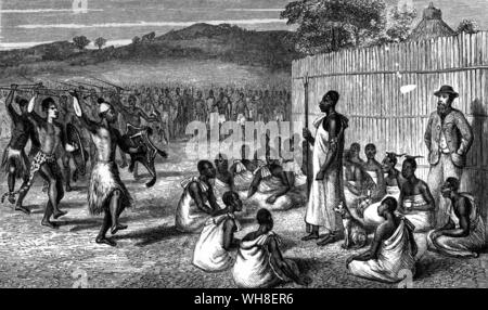 Mtesa, (Kabaka du Buganda) avec son chien blanc symbolique à ses pieds, ses troupes tout en Ouganda commentaires Speke (extrême droite). John Hanning Speke (1827-1864) était un officier de l'armée indienne britannique, qui effectue trois voyages d'exploration à l'Afrique. L'aventure africaine, une histoire d'Afrique, les explorateurs par Timothy Severin, page 235. . . Banque D'Images