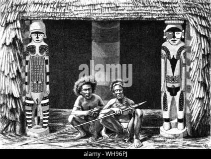 Guinée : les autochtones. J J a appelé l'sauvages figures sculptées du temple en détail.. . Les autochtones à l'entrée d'un immeuble sur l'île sauvage des îles de l'Amirauté . Banque D'Images