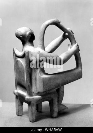 Sculpture cycladique. c 2500 BC. . Statuette : Homme assis avec harpe. En Banque D'Images